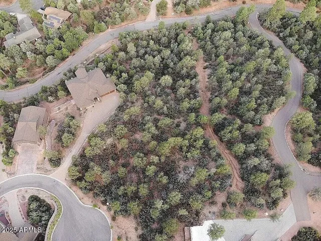 an aerial view of residential house with outdoor space