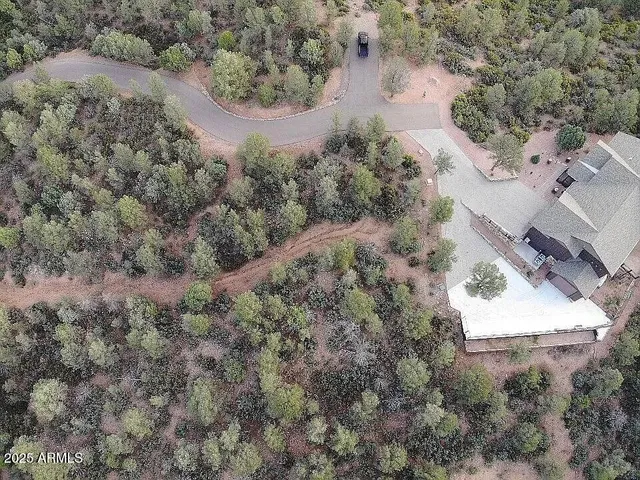an aerial view of a house with a outdoor space