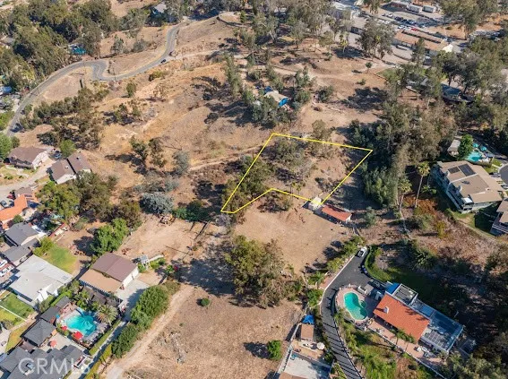 an aerial view of residential house with outdoor space
