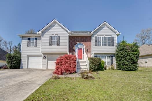 4 Butternut Lane Rome, GA 30165 - Photo 1 of 1 a front view of a house with a yard