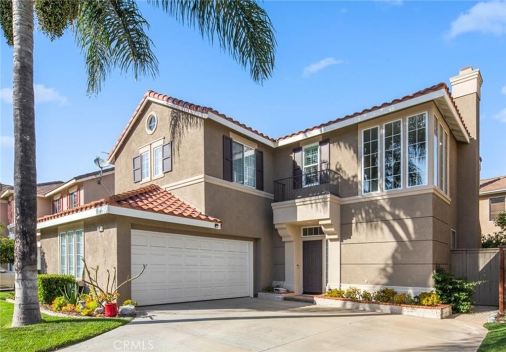 62 Northern Pine Loop Aliso Viejo, CA 92656 - Photo 1 of 27 a front view of a house with a yard