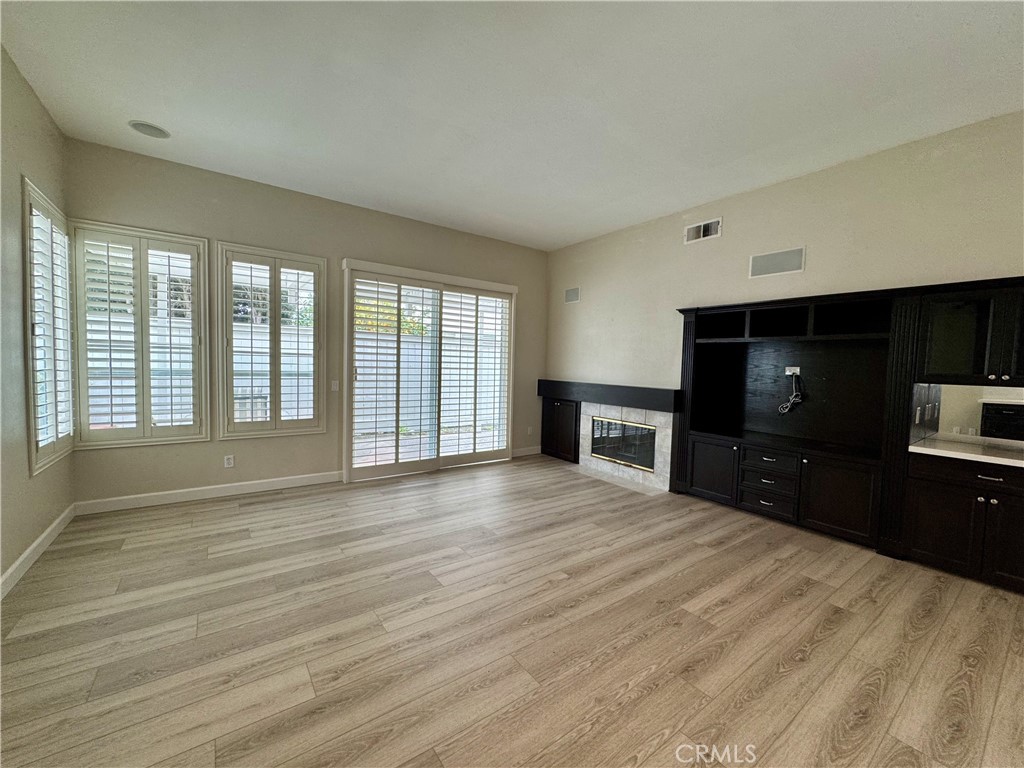 62 Northern Pine Loop Aliso Viejo, CA 92656 - Photo 12 of 27 a view of an empty room with a kitchen and a window