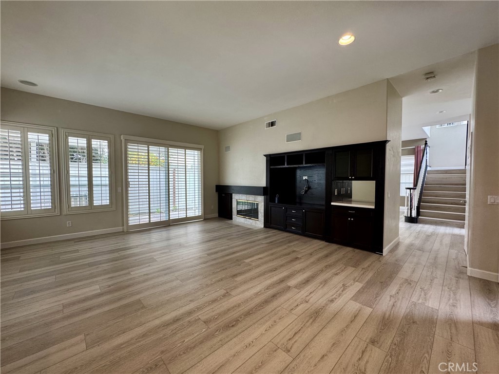 62 Northern Pine Loop Aliso Viejo, CA 92656 - Photo 13 of 27 a view of kitchen with furniture and wooden floor