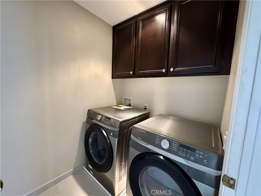 62 Northern Pine Loop Aliso Viejo, CA 92656 - Photo 21 of 27 a utility room with dryer and washer