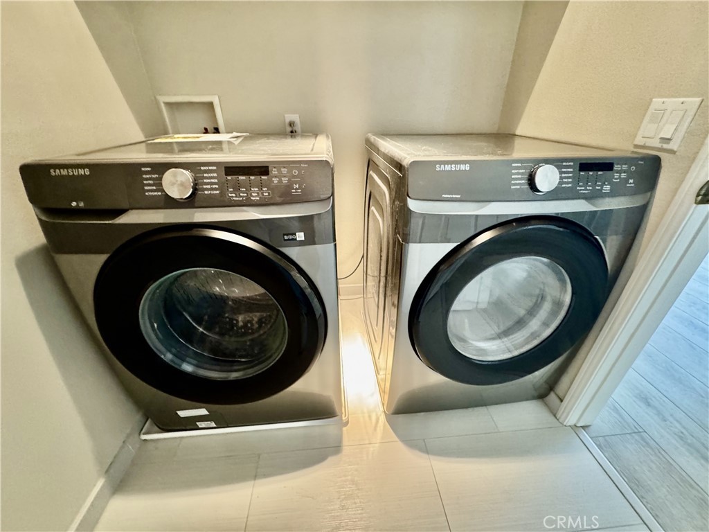 62 Northern Pine Loop Aliso Viejo, CA 92656 - Photo 22 of 27 a utility room with dryer and washer