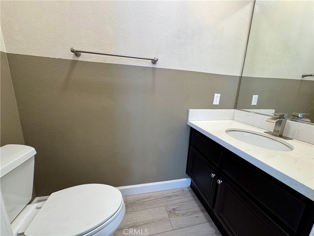 62 Northern Pine Loop Aliso Viejo, CA 92656 - Photo 25 of 27 a bathroom with a sink a toilet and vanity