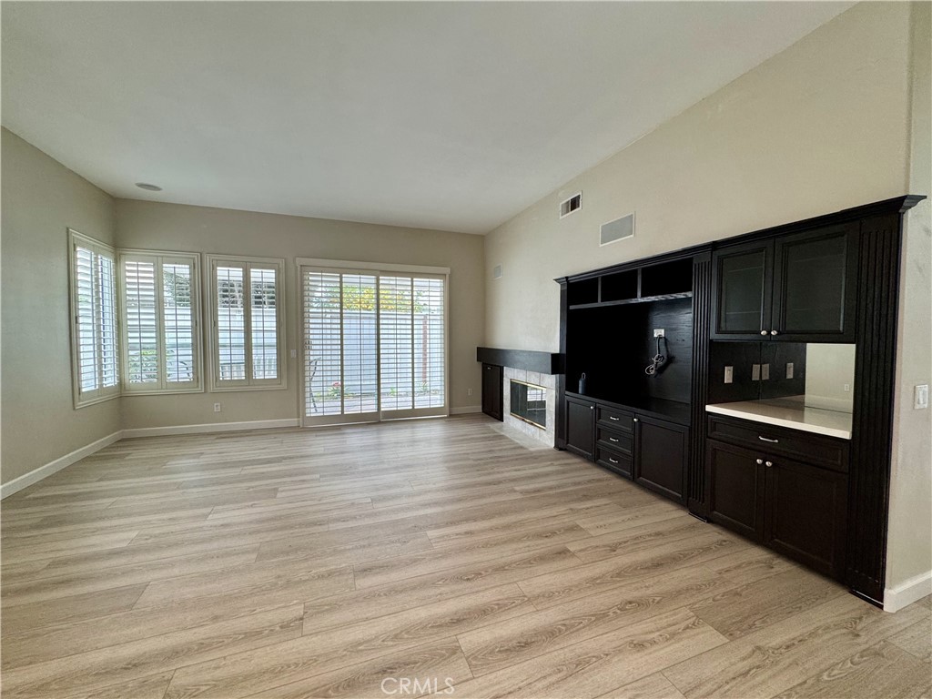 62 Northern Pine Loop Aliso Viejo, CA 92656 - Photo 10 of 27 a kitchen with a stove and a refrigerator