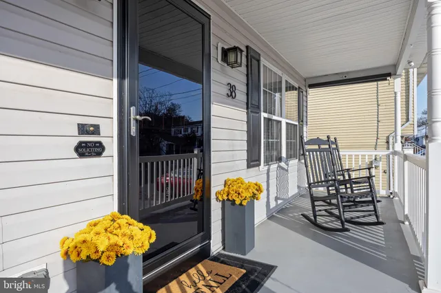 a view of balcony with two chairs