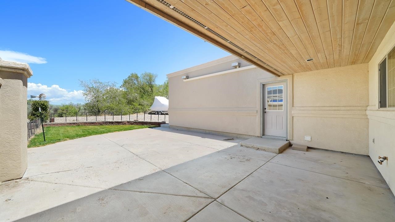 1296 Santa Fe Circle Fruita, CO 81521 - Photo 15 of 22 a view of a backyard of the house