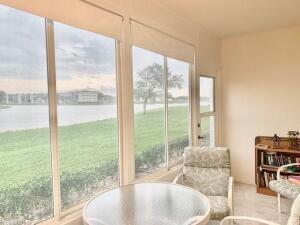 1050 Cornwall C Boca Raton, FL 33434 - Photo 14 of 27 Enclosed Patio w/Lake View