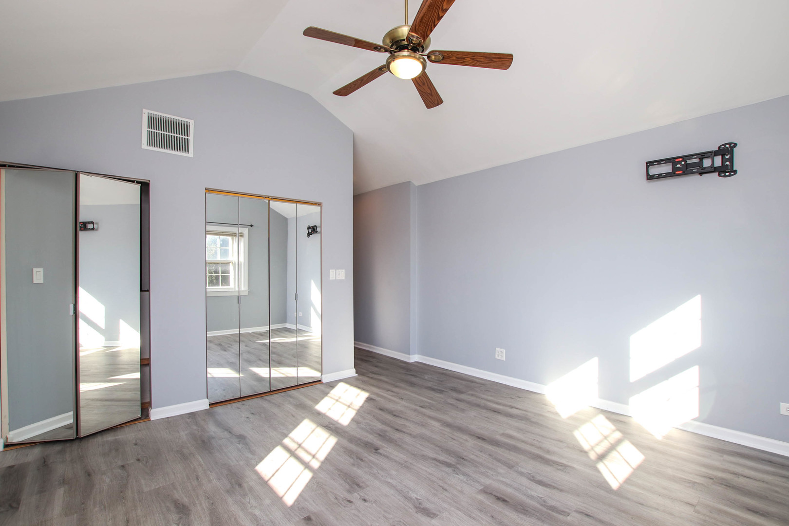 5815 North Canfield Avenue Chicago, IL 60631 - Photo 15 of 28 a view of empty room with wooden floor and fan