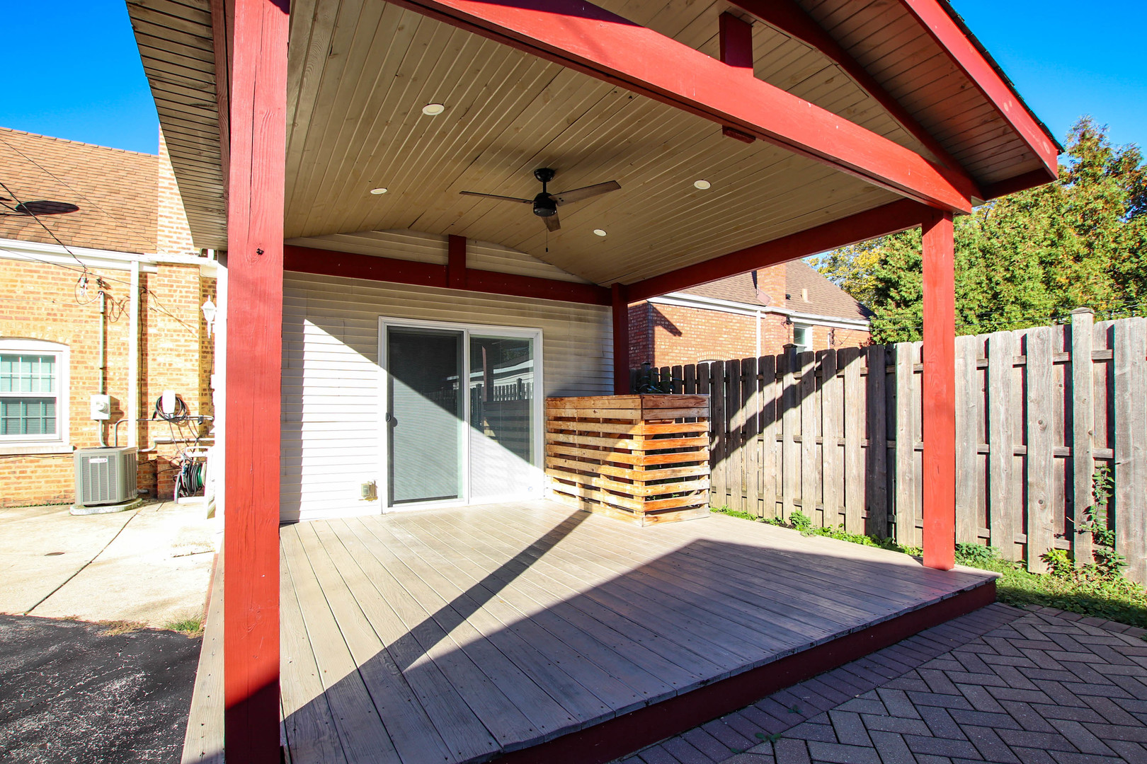 5815 North Canfield Avenue Chicago, IL 60631 - Photo 26 of 28 a balcony with wooden floor table and chairs