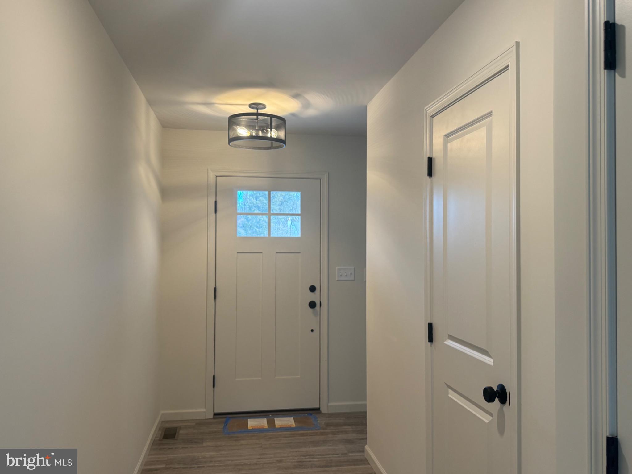 158 Leary Road Honey Brook, PA 19344 - Photo 17 of 21 Inviting entryway with modern lighting.