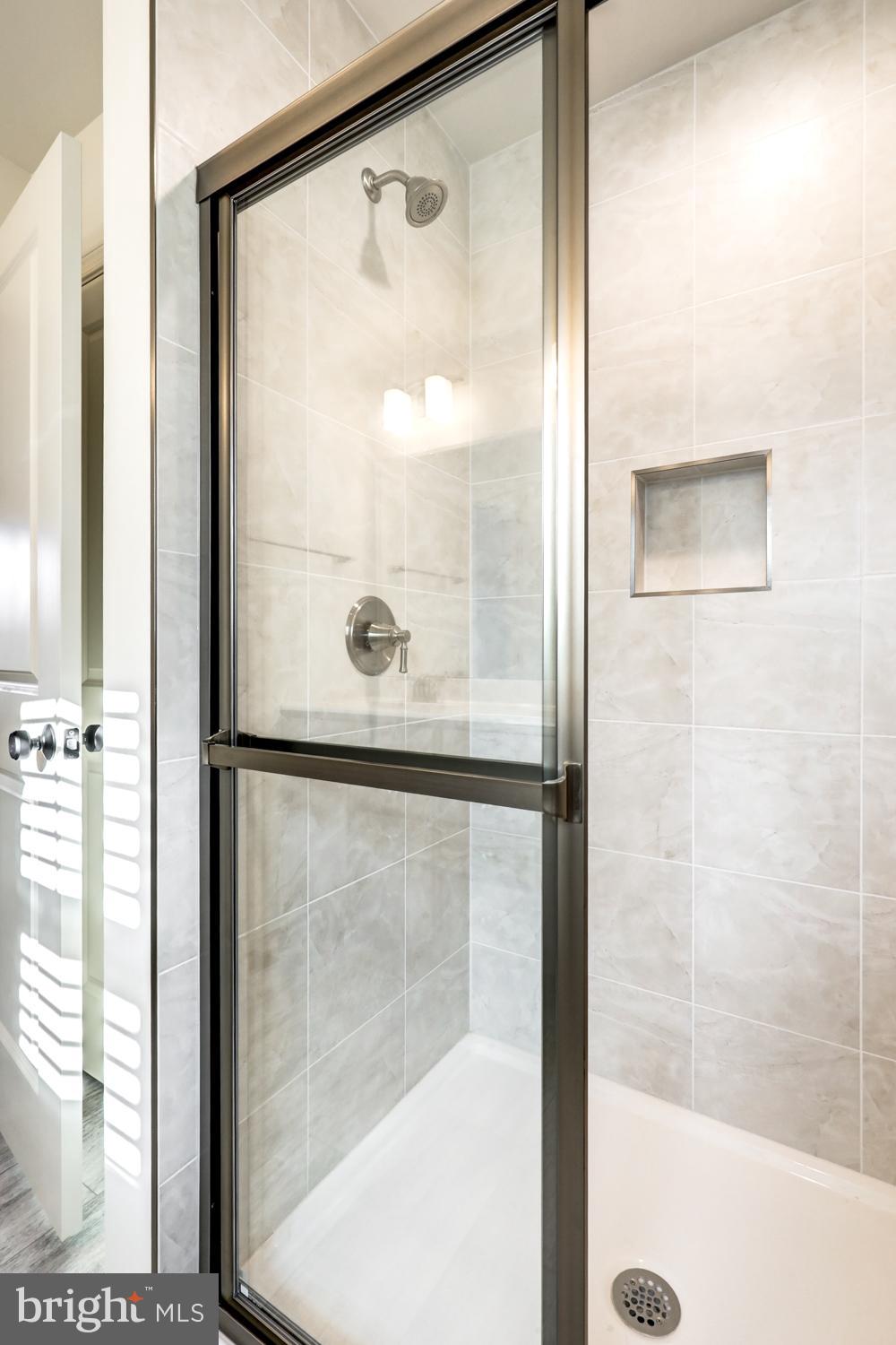 158 Leary Road Honey Brook, PA 19344 - Photo 10 of 41 Sleek modern shower with elegant finishes.