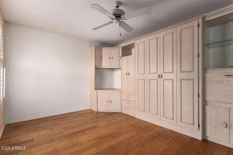 a view of a kitchen with wooden cabinet and a cabinet