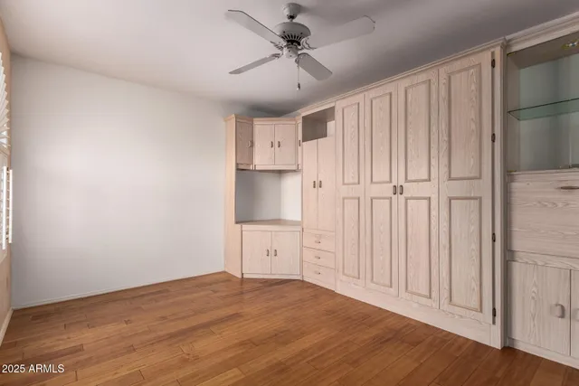 a view of a kitchen with wooden cabinet and a cabinet