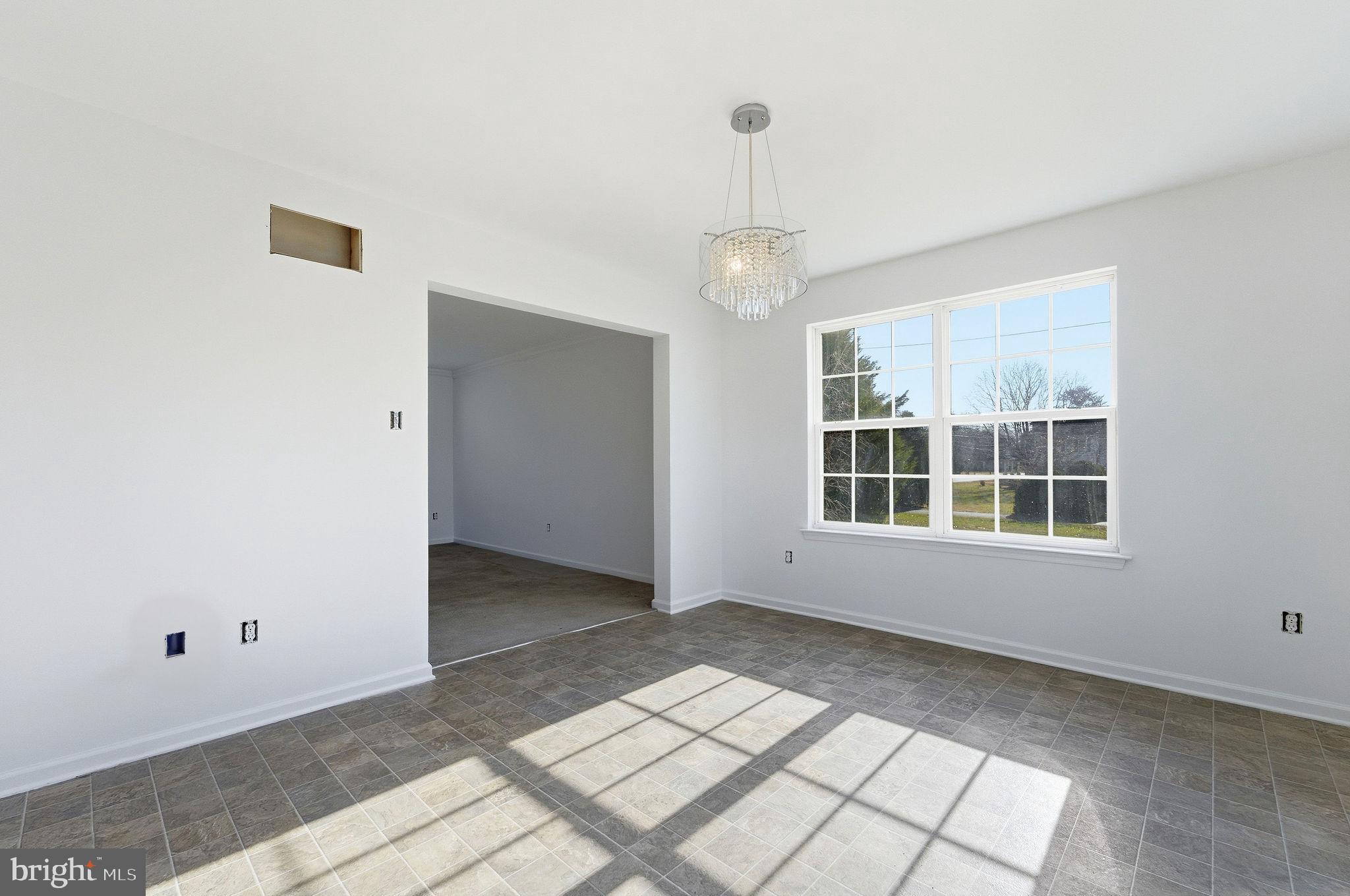 92 North Burlington Road Bridgeton, NJ 08302 - Photo 11 of 24 a view of an empty room with a window