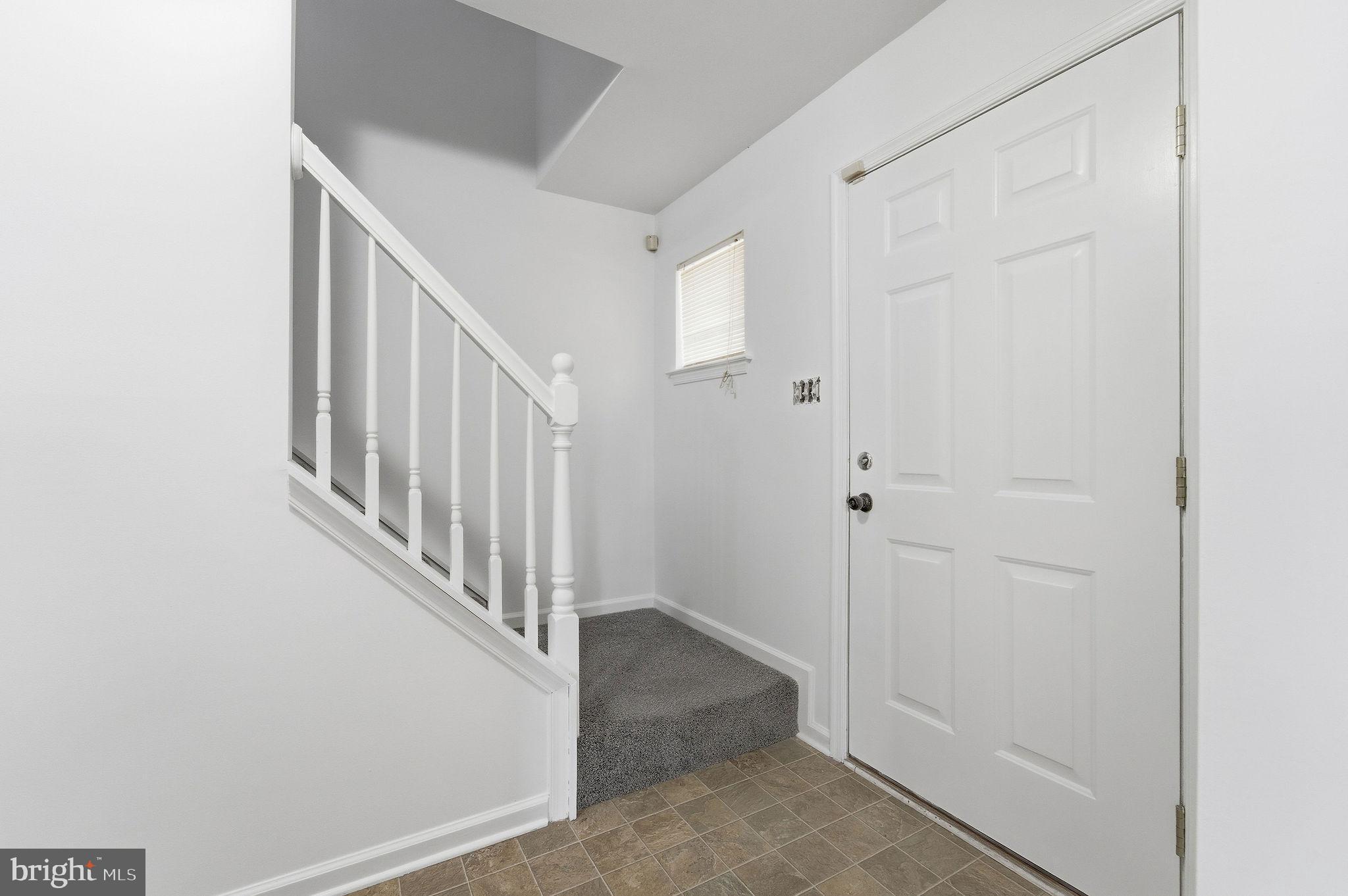 92 North Burlington Road Bridgeton, NJ 08302 - Photo 5 of 24 a view of a hallway with staircase