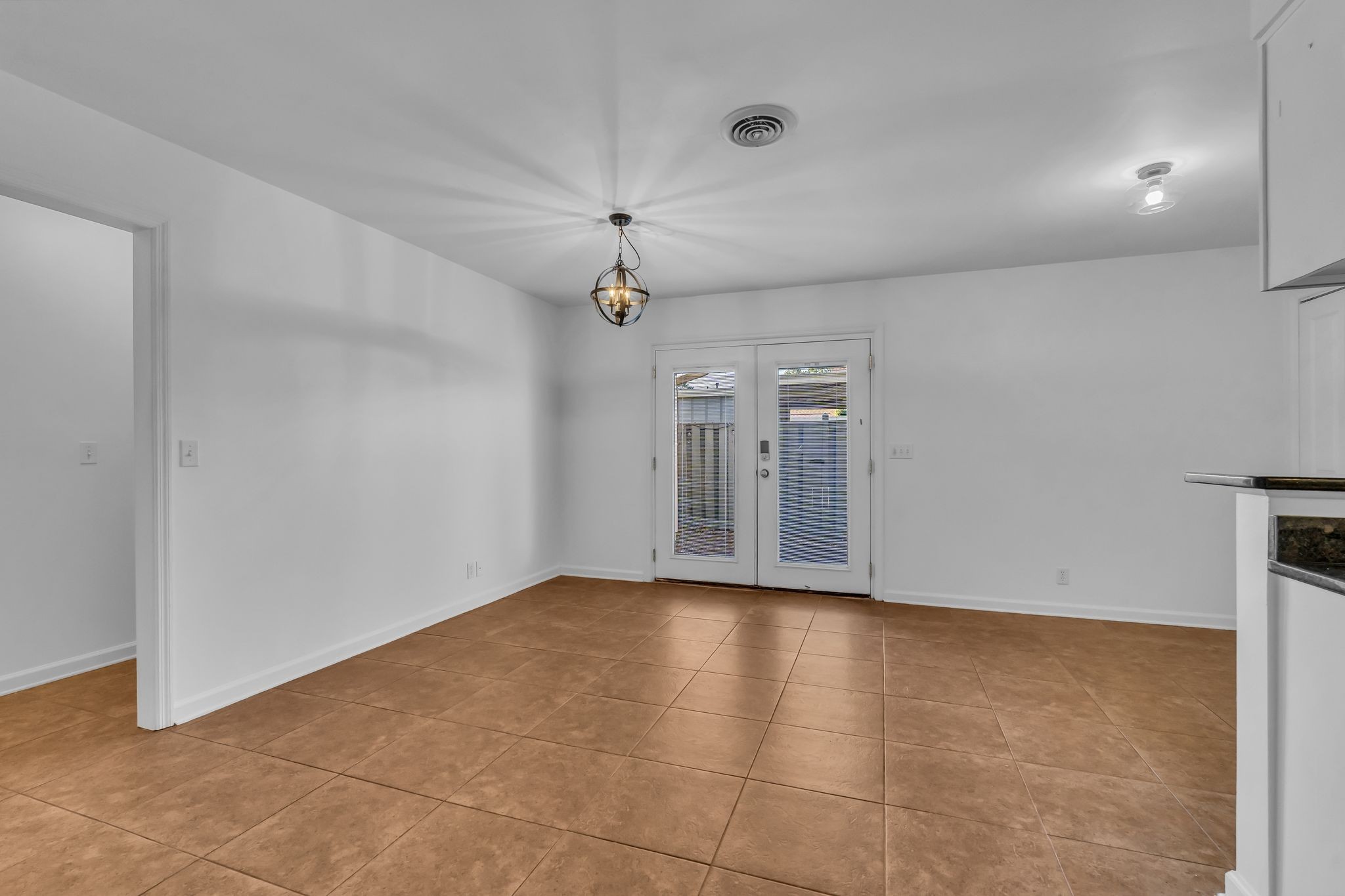 8300 Sawyer Brown Road, Unit M301 Nashville, TN 37221 - Photo 14 of 36 a view of an empty room with a window