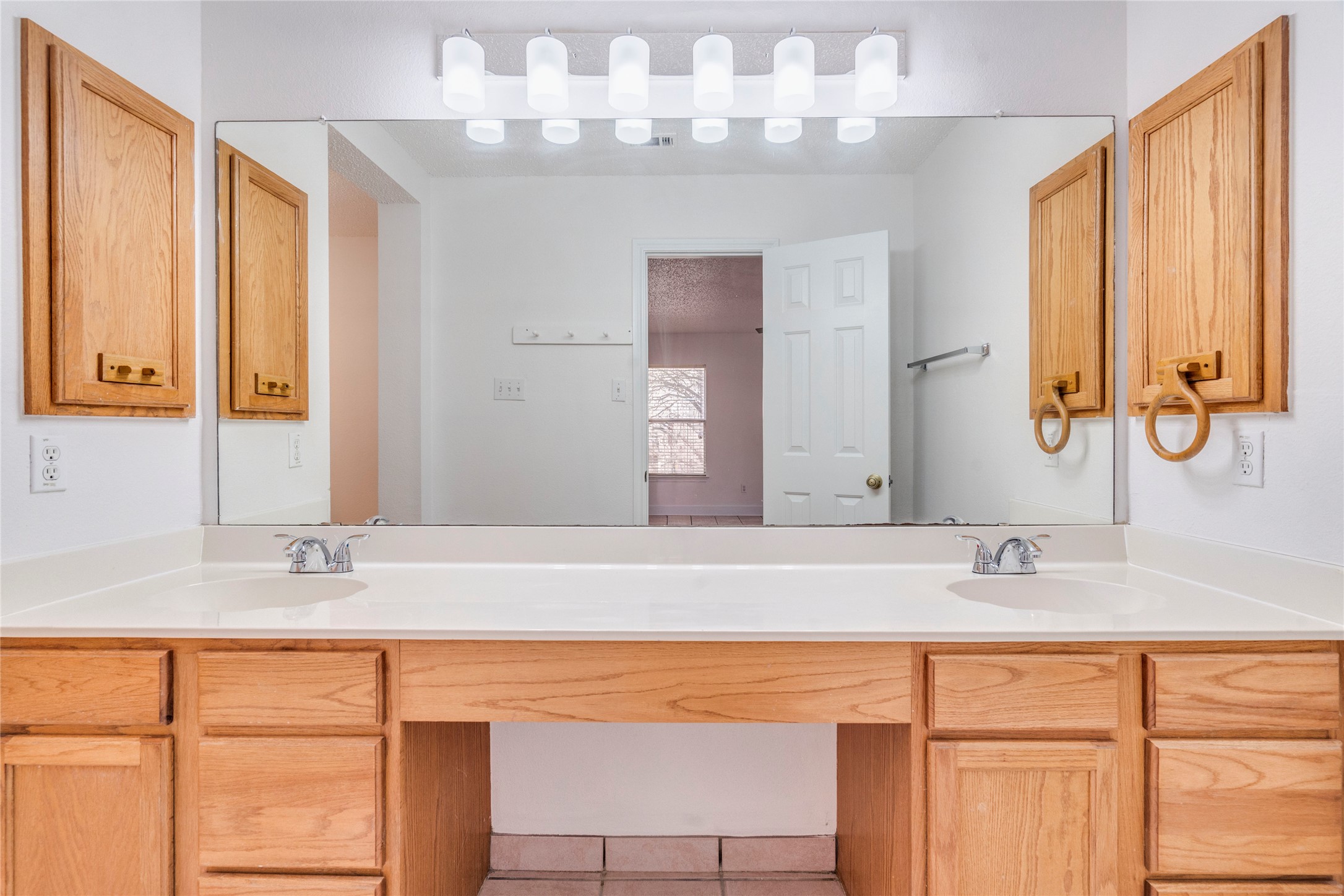 2013 Jasper Lane Cedar Park, TX 78613 - Photo 14 of 25 a bathroom with a sink and a mirror