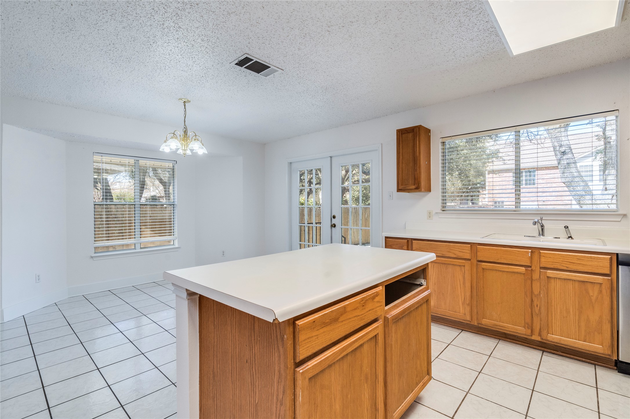 2013 Jasper Lane Cedar Park, TX 78613 - Photo 10 of 25 a kitchen that has a sink and a stove in it
