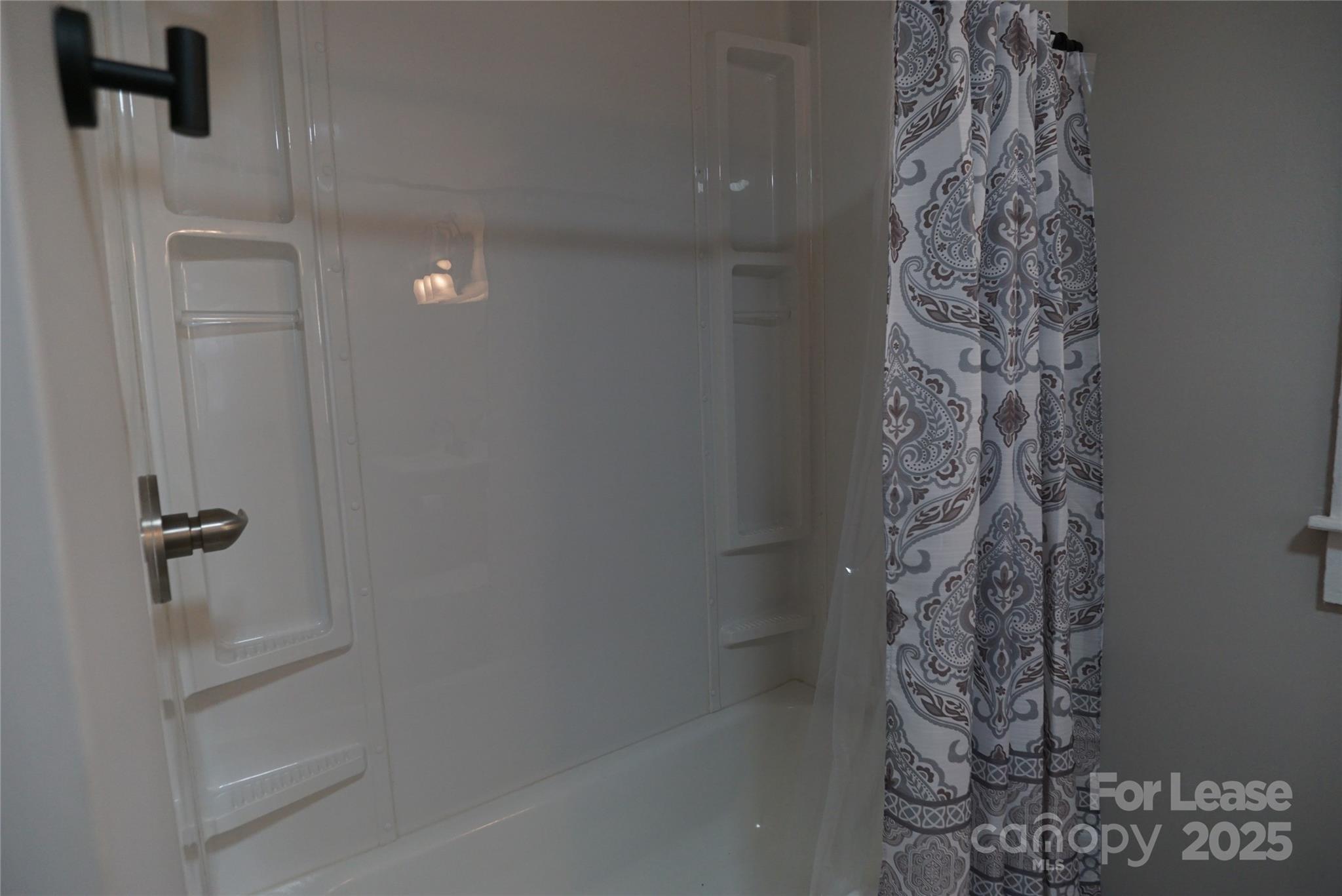 146 Fairway Avenue Hudson, NC 28638 - Photo 7 of 9 a bathroom with a shower