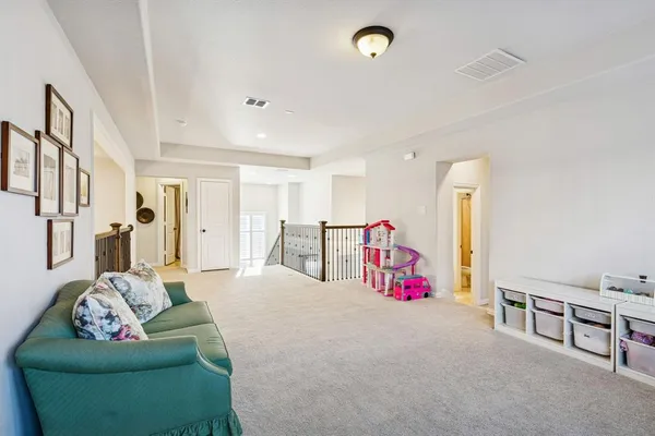 a living room with furniture and a couch