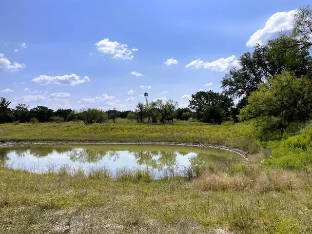 a view of a lake with a lake in the background and lake view