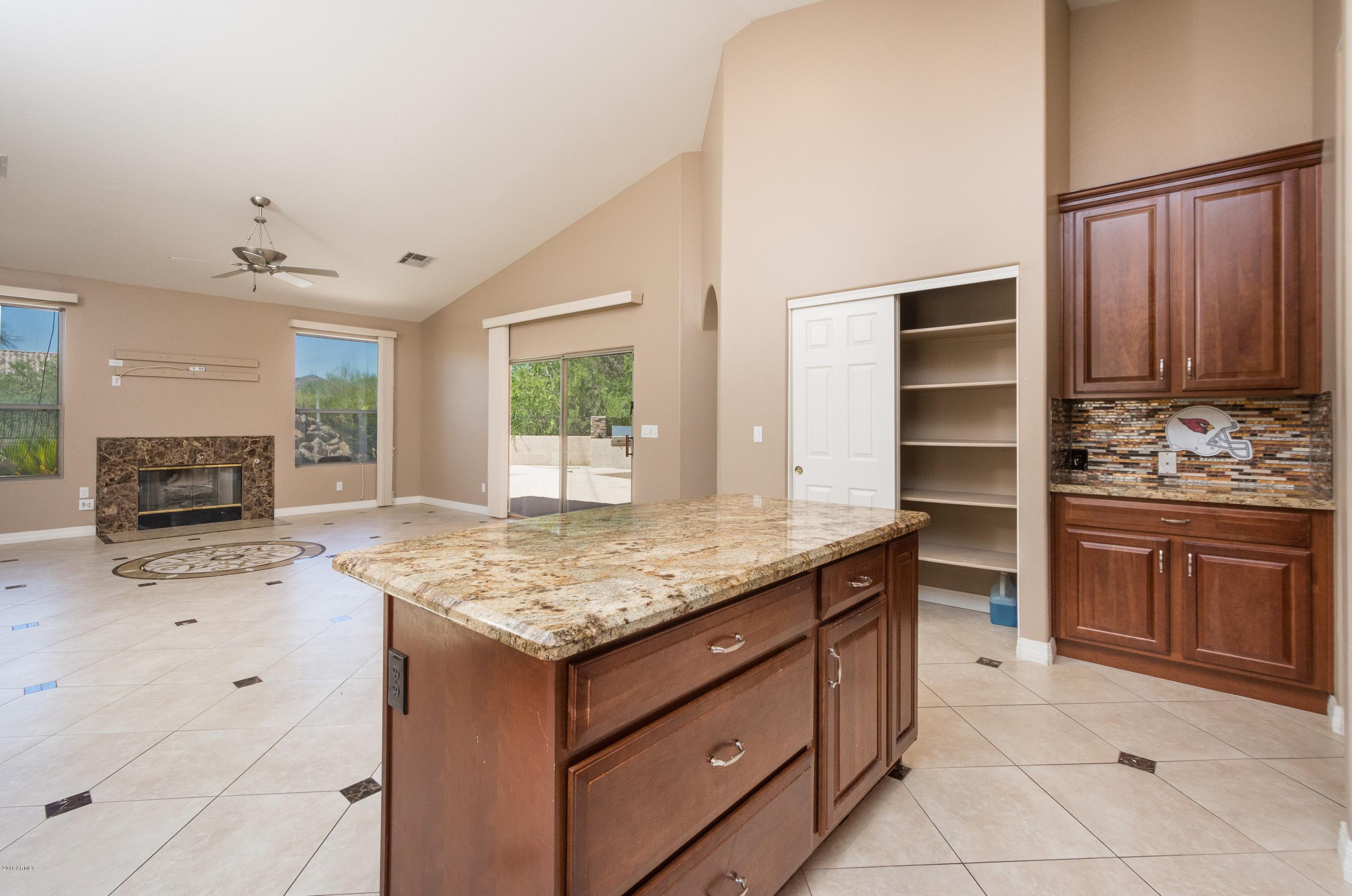 903 East Redfield Road Phoenix, AZ 85022 - Photo 7 of 27 007_Kitchen to Family Room