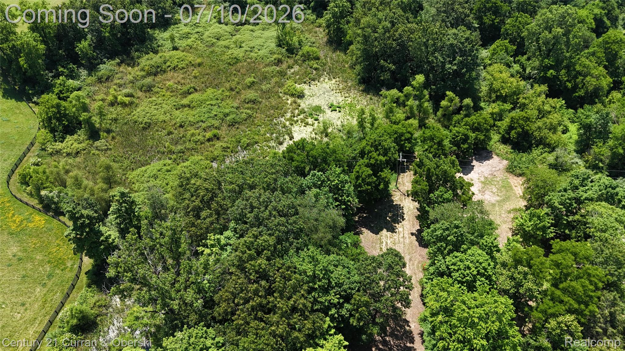 13505 Island Lake Road Chelsea, MI 48118 - Photo 8 of 23 DJI_20260703133402_0174_D.JPG