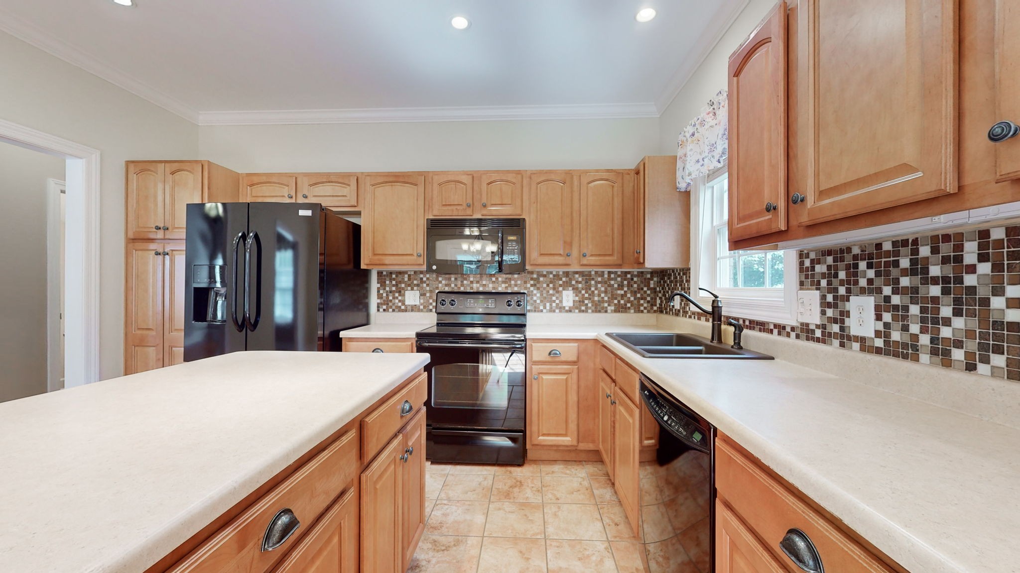 257 Conquest Road Murfreesboro, TN 37128 - Photo 11 of 44 a kitchen with a sink a stove and refrigerator