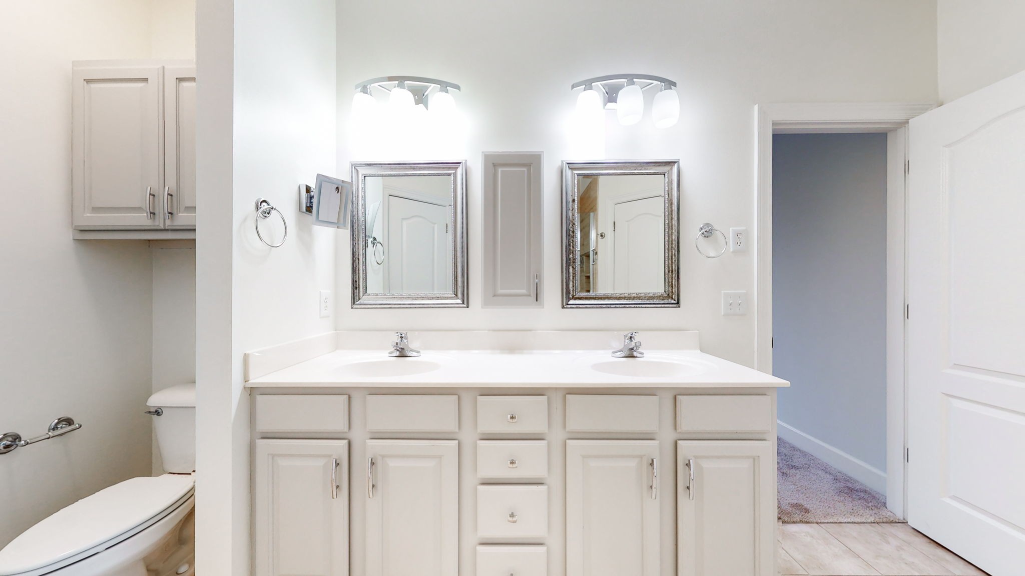 257 Conquest Road Murfreesboro, TN 37128 - Photo 16 of 44 a bathroom with double sink and a mirror