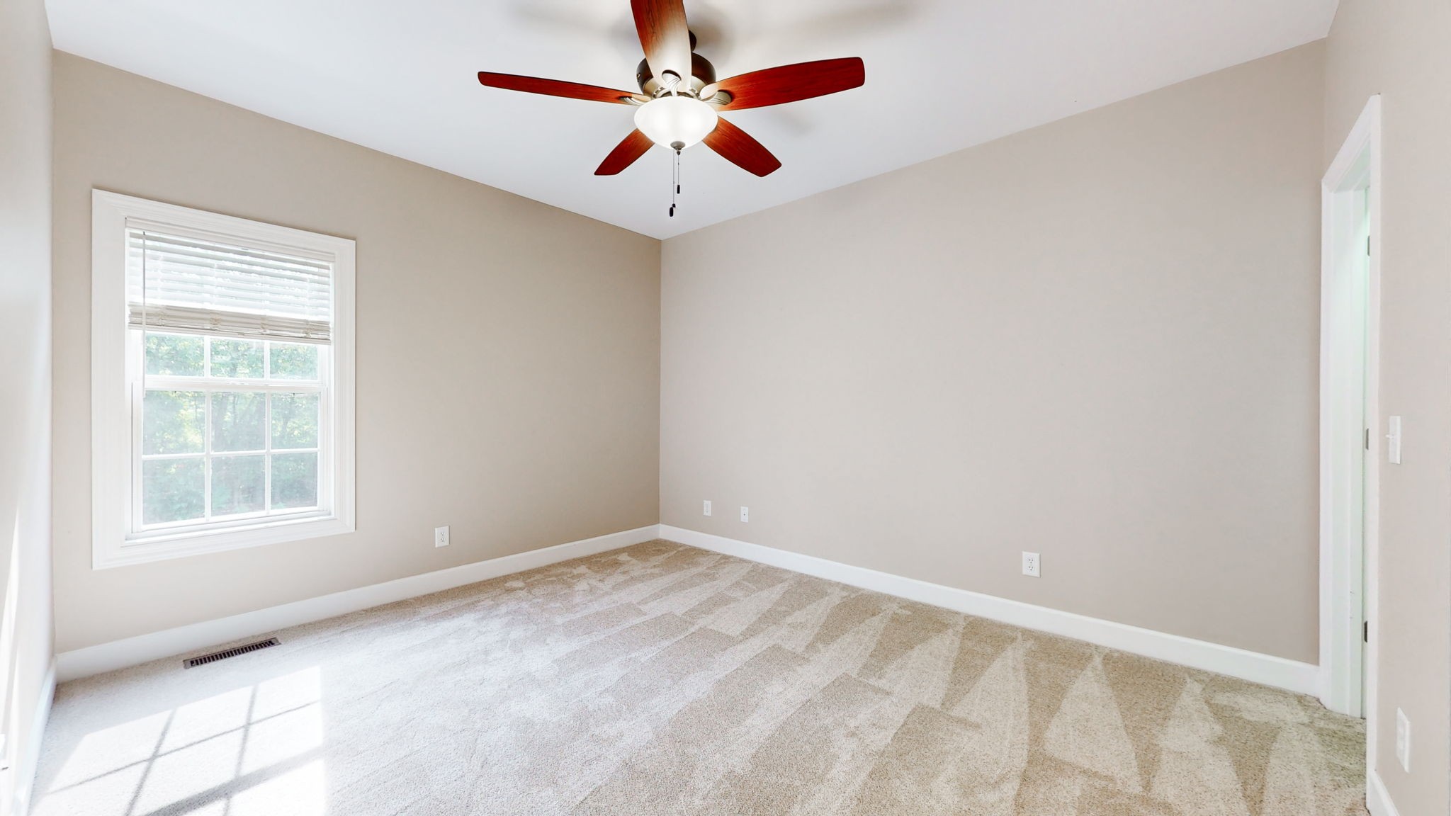 257 Conquest Road Murfreesboro, TN 37128 - Photo 19 of 44 an empty room with windows and fan
