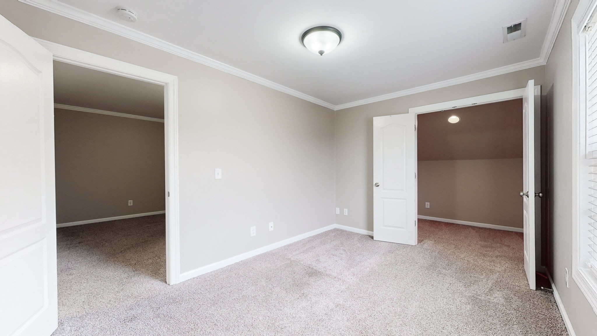 257 Conquest Road Murfreesboro, TN 37128 - Photo 25 of 44 a view of an empty room with closet and wooden door