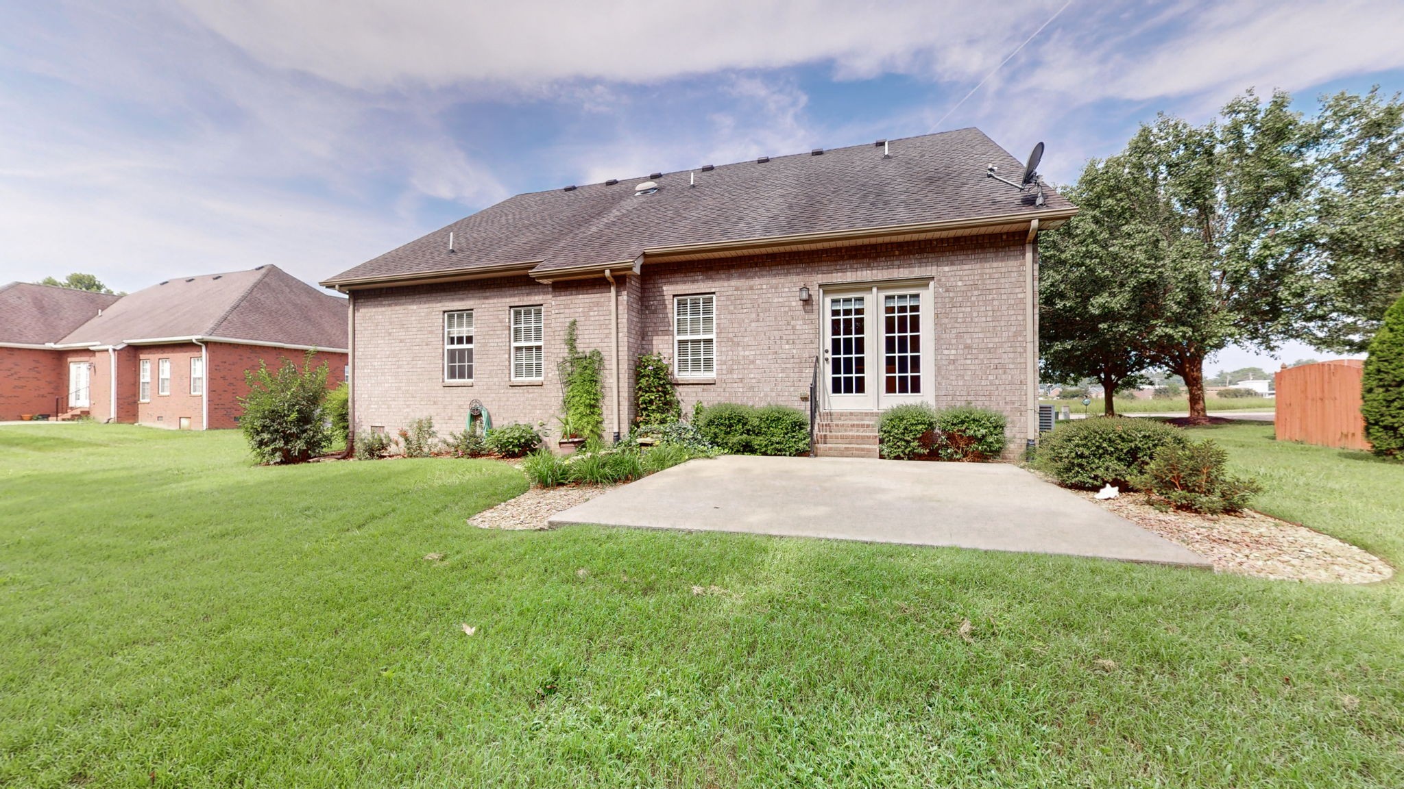 257 Conquest Road Murfreesboro, TN 37128 - Photo 37 of 44 a front view of a house with a yard and garage