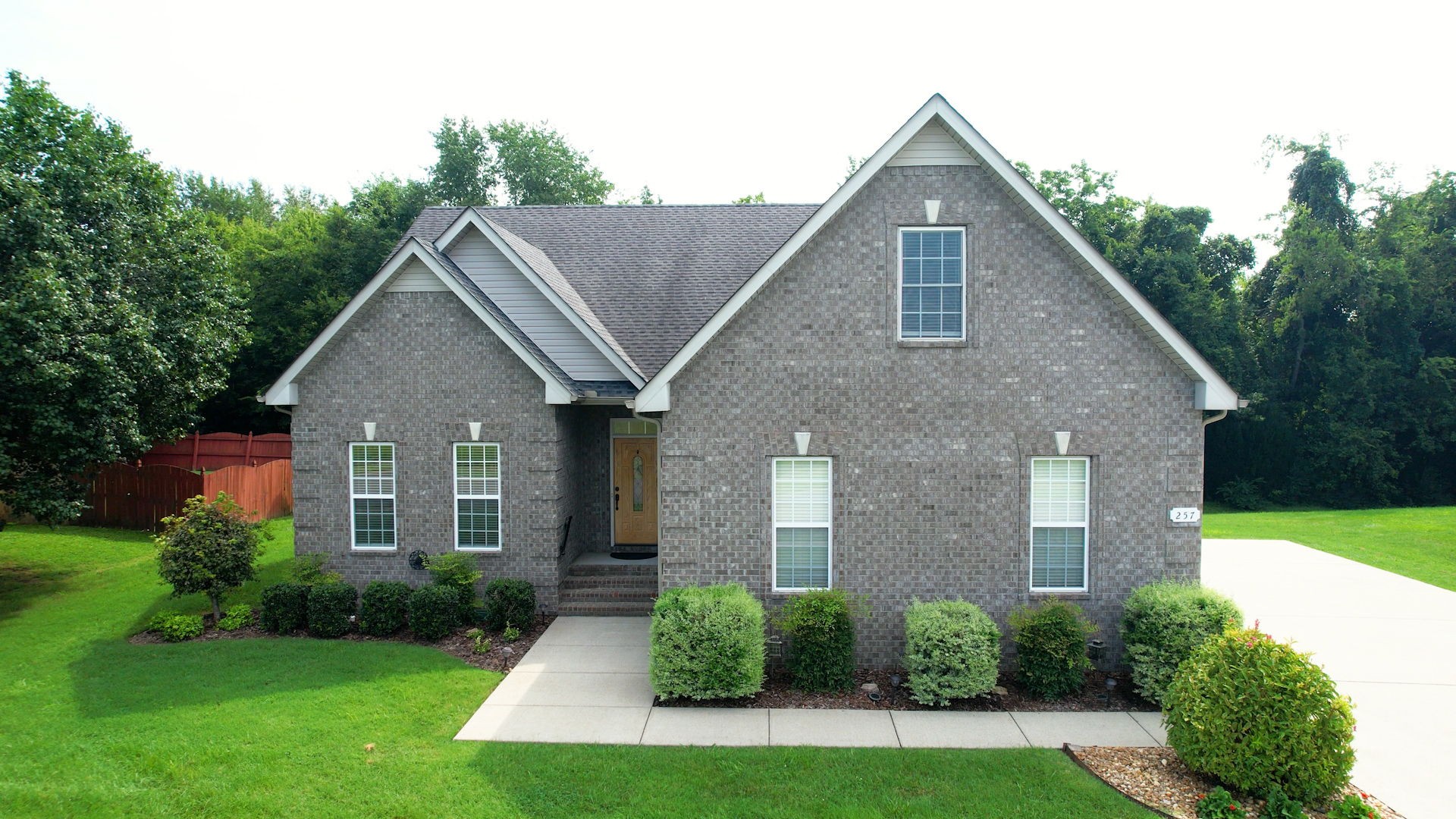 257 Conquest Road Murfreesboro, TN 37128 - Photo 39 of 44 a front view of a house with garden