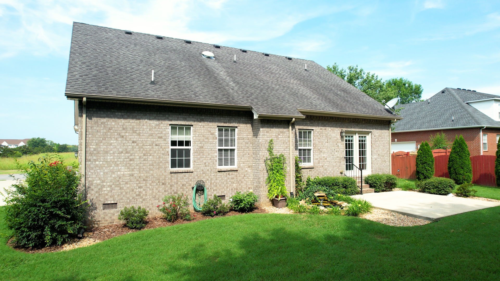 257 Conquest Road Murfreesboro, TN 37128 - Photo 40 of 44 a front view of a house with garden