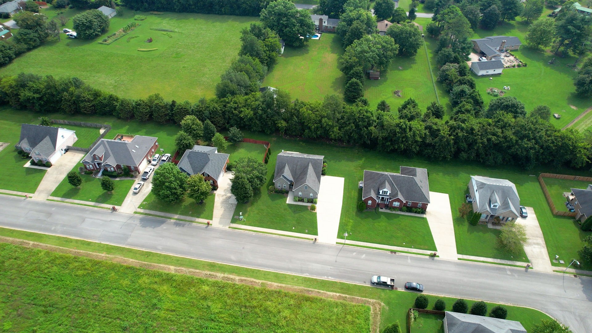 257 Conquest Road Murfreesboro, TN 37128 - Photo 42 of 44 an aerial view of a house having yard