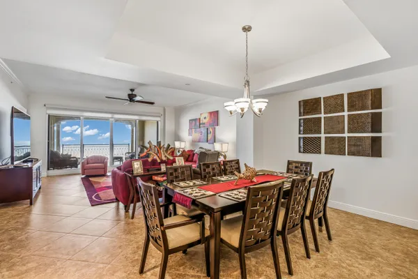 a view of a dining room with furniture window and outside view