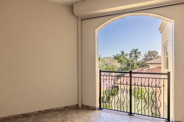 a view of a glass door and a window