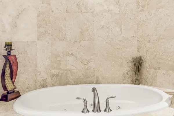 a bathroom with a bathtub