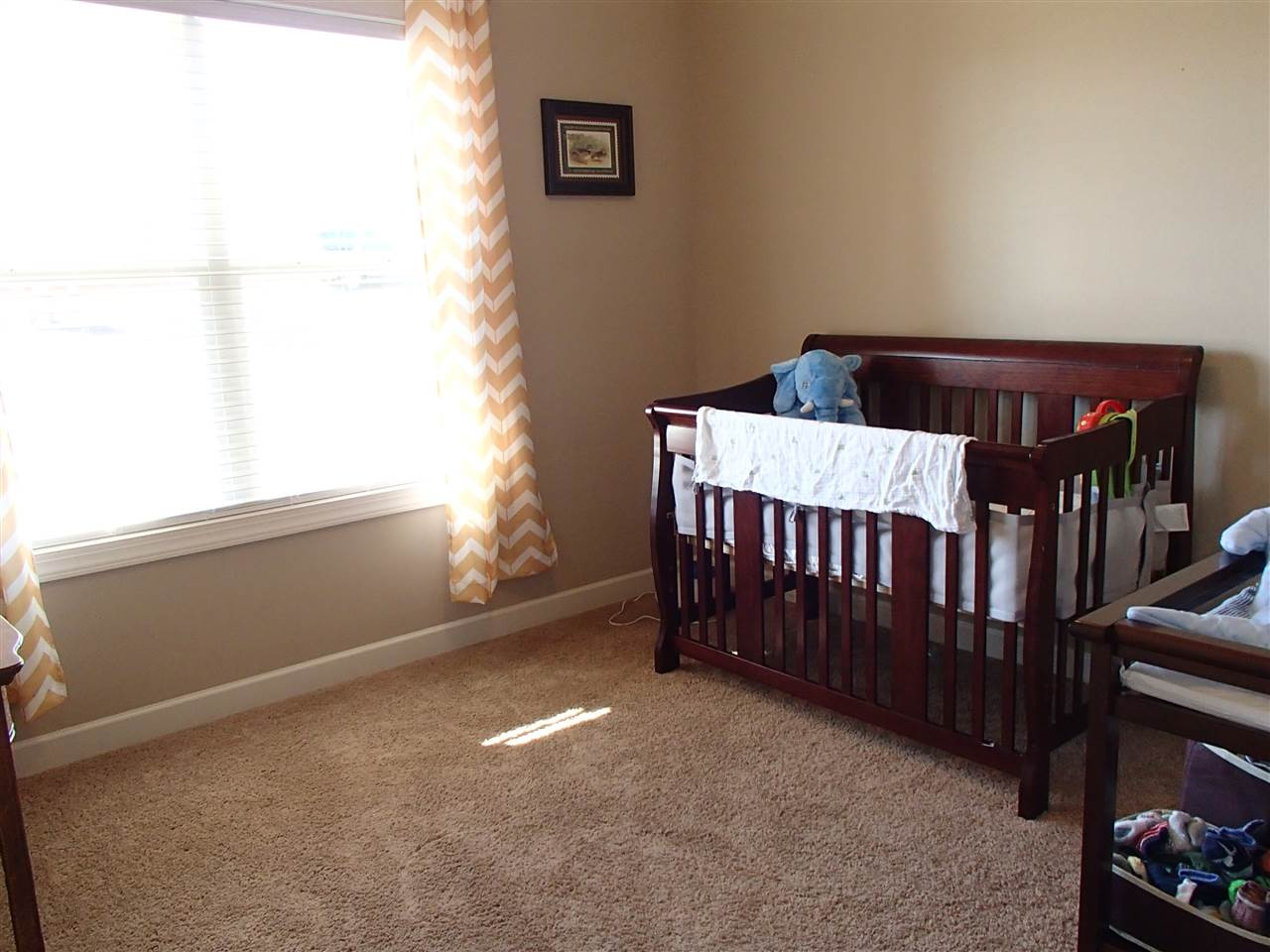 2183 Matthews Road Clayton, NC 27520 - Photo 19 of 25 Bedroom 2 is good sized and well lit and features a large closet. Bedroom