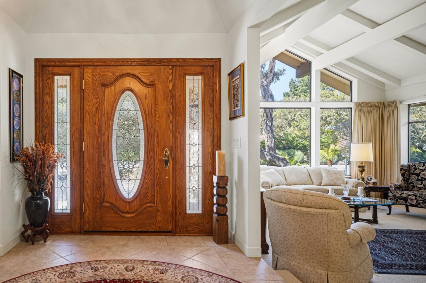 2911 Colton Road Pebble Beach, CA 93953 - Photo 4 of 46 a living room with fireplace furniture and a large window