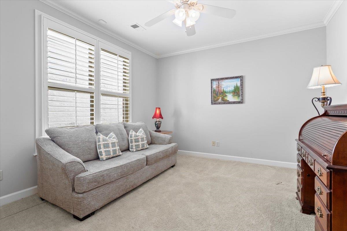 1495 Kimbrough Road Germantown, TN 38138 - Photo 21 of 31 Sitting room featuring crown molding, carpet floors, baseboards, visible vents, and ceiling fan