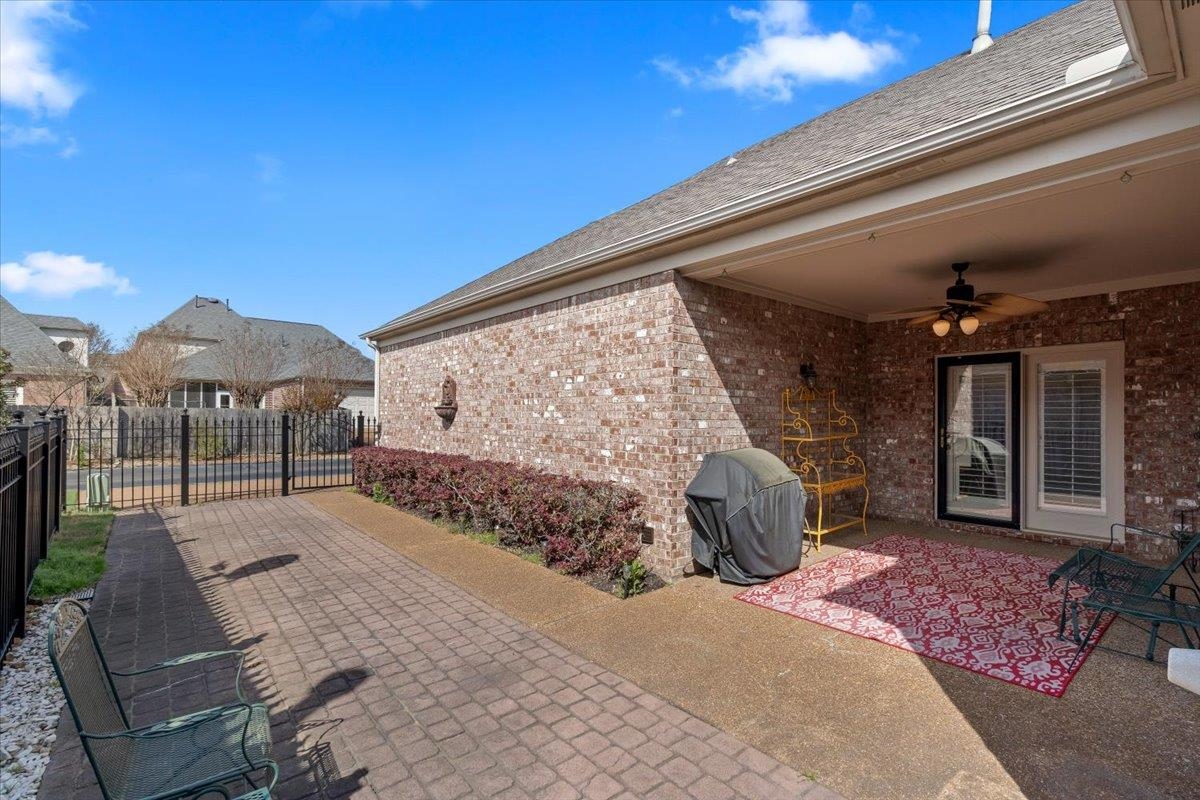1495 Kimbrough Road Germantown, TN 38138 - Photo 26 of 31 View of patio with a grill, ceiling fan, fence, and a gate