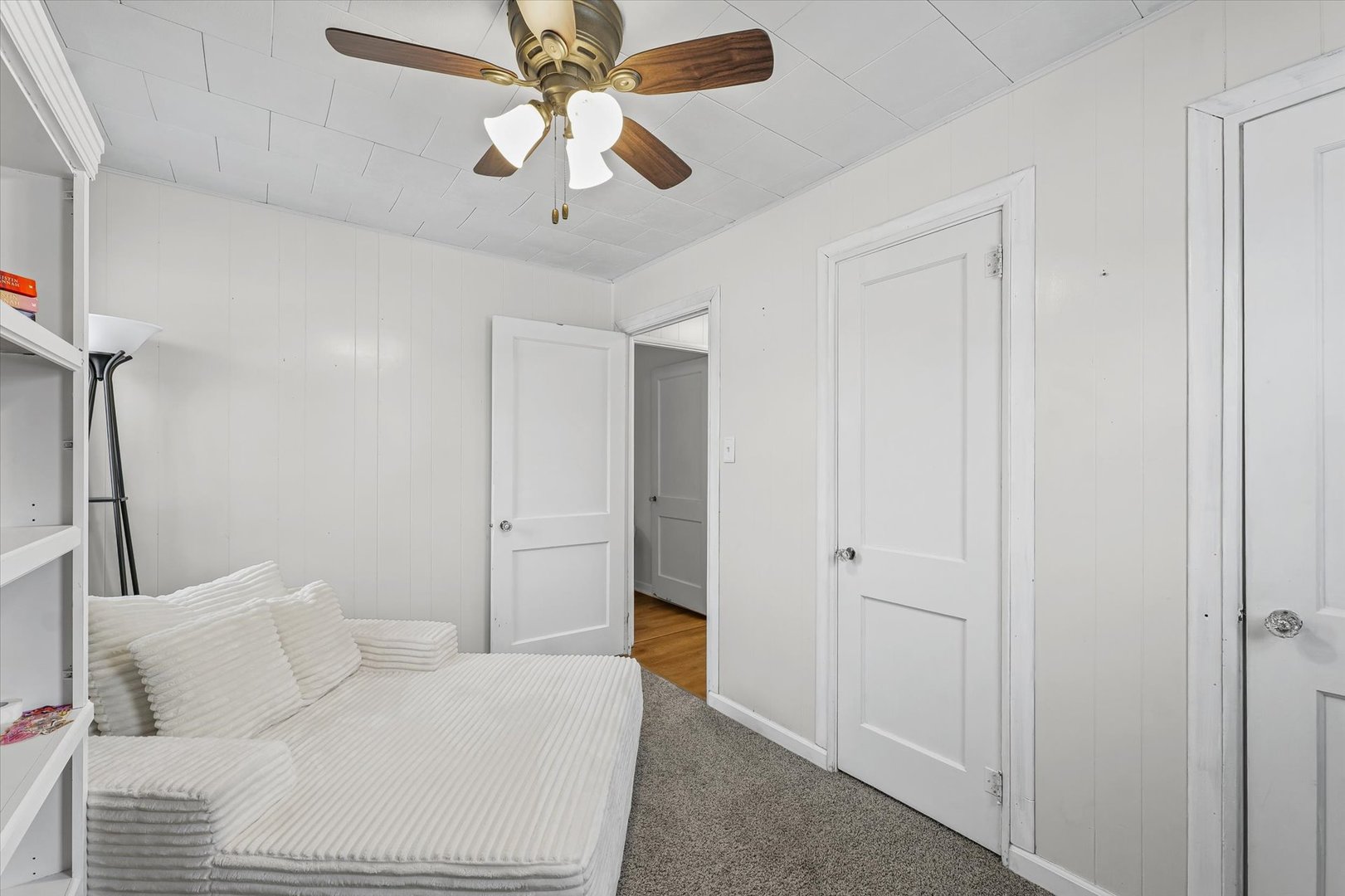 310 East Main Street Buckley, IL 60918 - Photo 17 of 28 a bedroom with a bed and a ceiling fan
