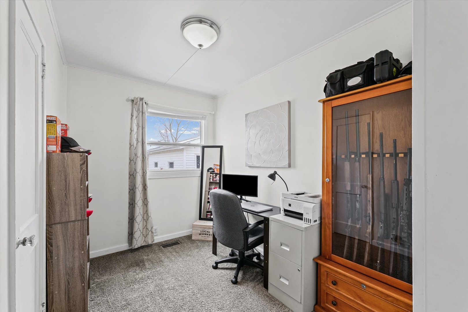 310 East Main Street Buckley, IL 60918 - Photo 18 of 28 a view of a workspace with furniture and a window