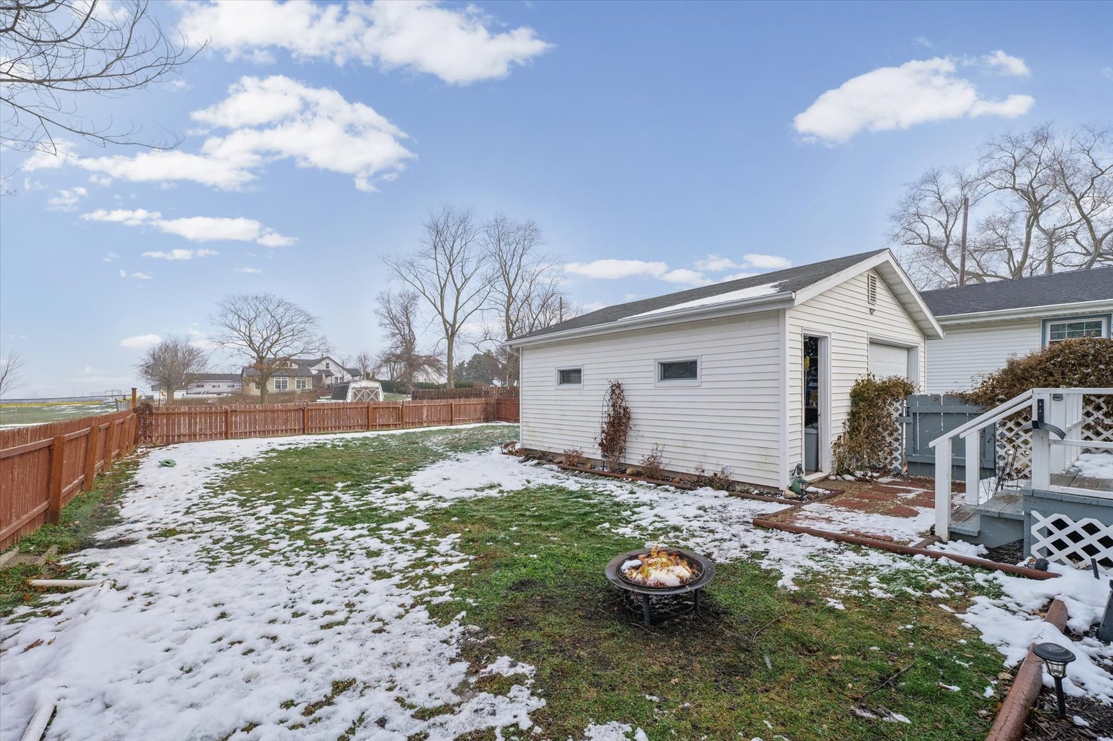310 East Main Street Buckley, IL 60918 - Photo 27 of 28 a view of a backyard with plants and a large tree