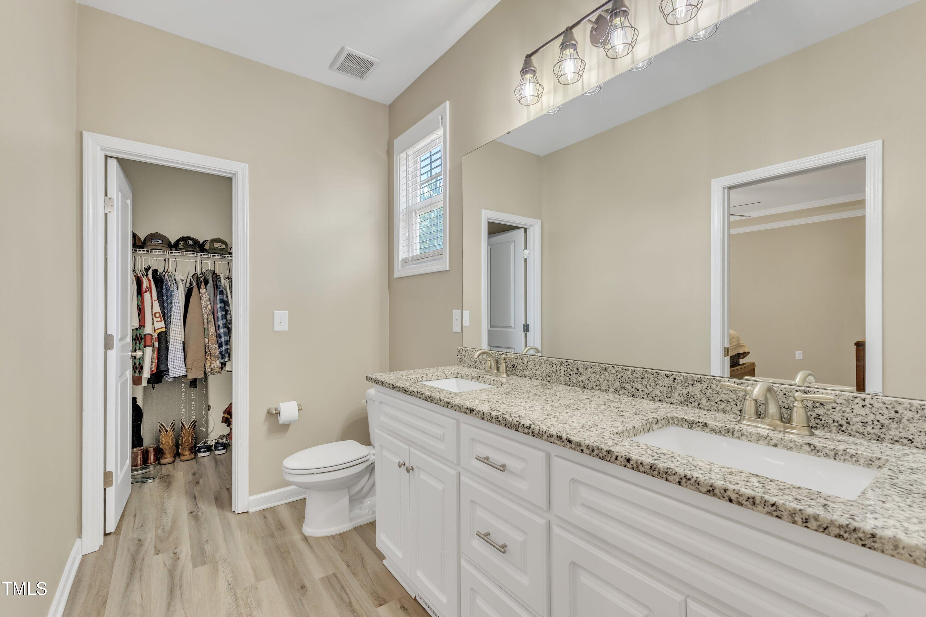 10387 Claude Lewis Road Middlesex, NC 27557 - Photo 23 of 37 Master bath features separate his/her closets