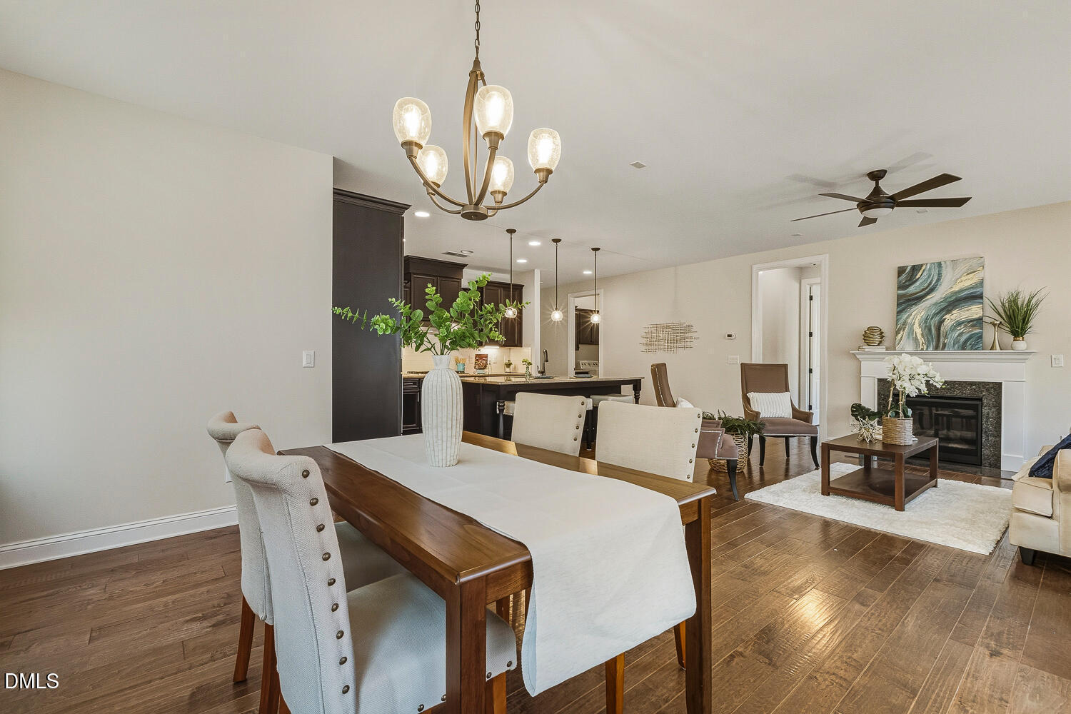1025 Nickelby Street Durham, NC 27703 - Photo 22 of 71 a view of a dining room with furniture wooden floor and chandelier